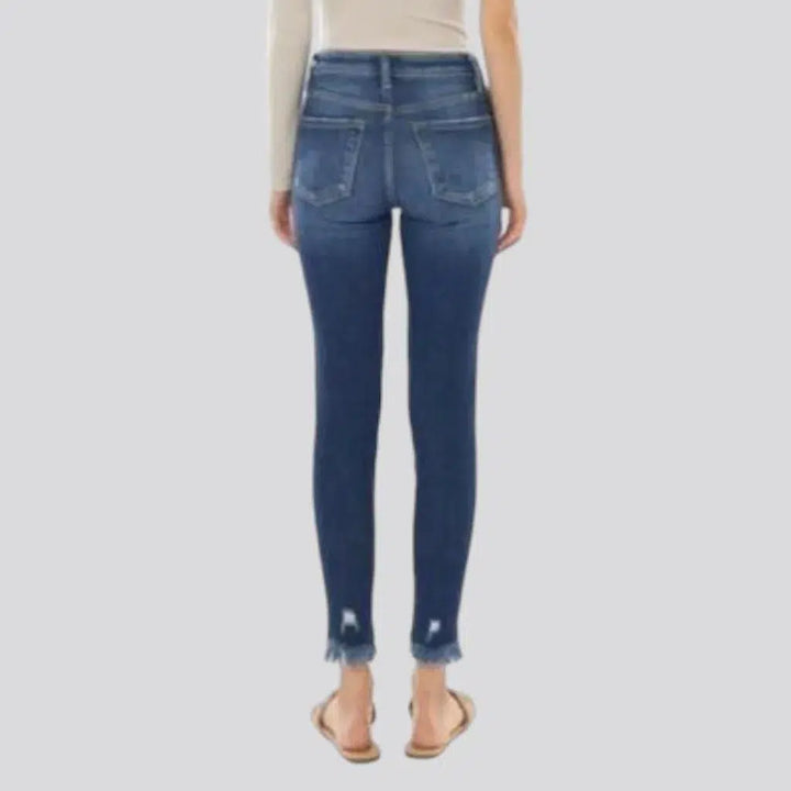 Medium-wash skinny jeans
 for ladies