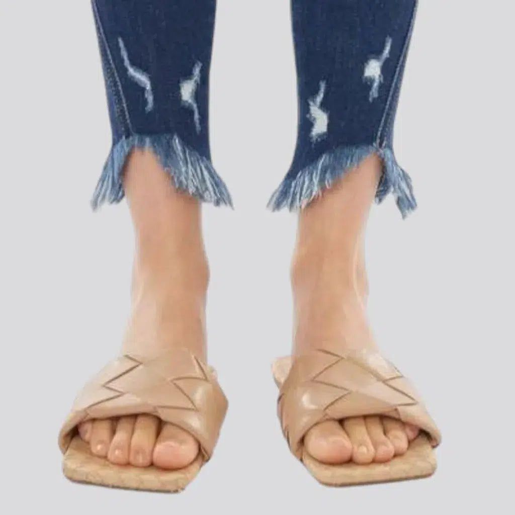 Medium-wash skinny jeans
 for ladies