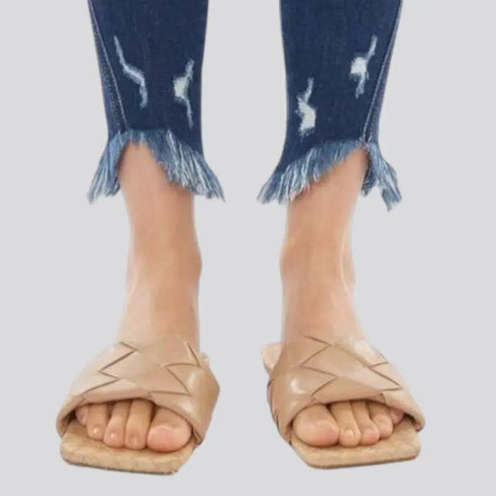 Medium-wash skinny jeans
 for ladies